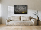 Circling Star Trails landscape canvas print on the wall of a living room