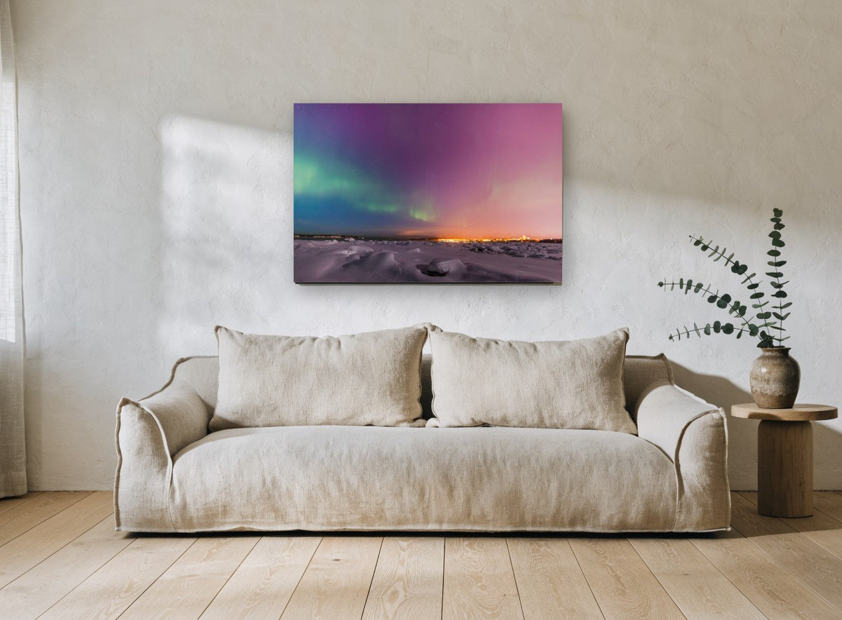 Aurora Over Snowfield landscape canvas print on the wall of a living room