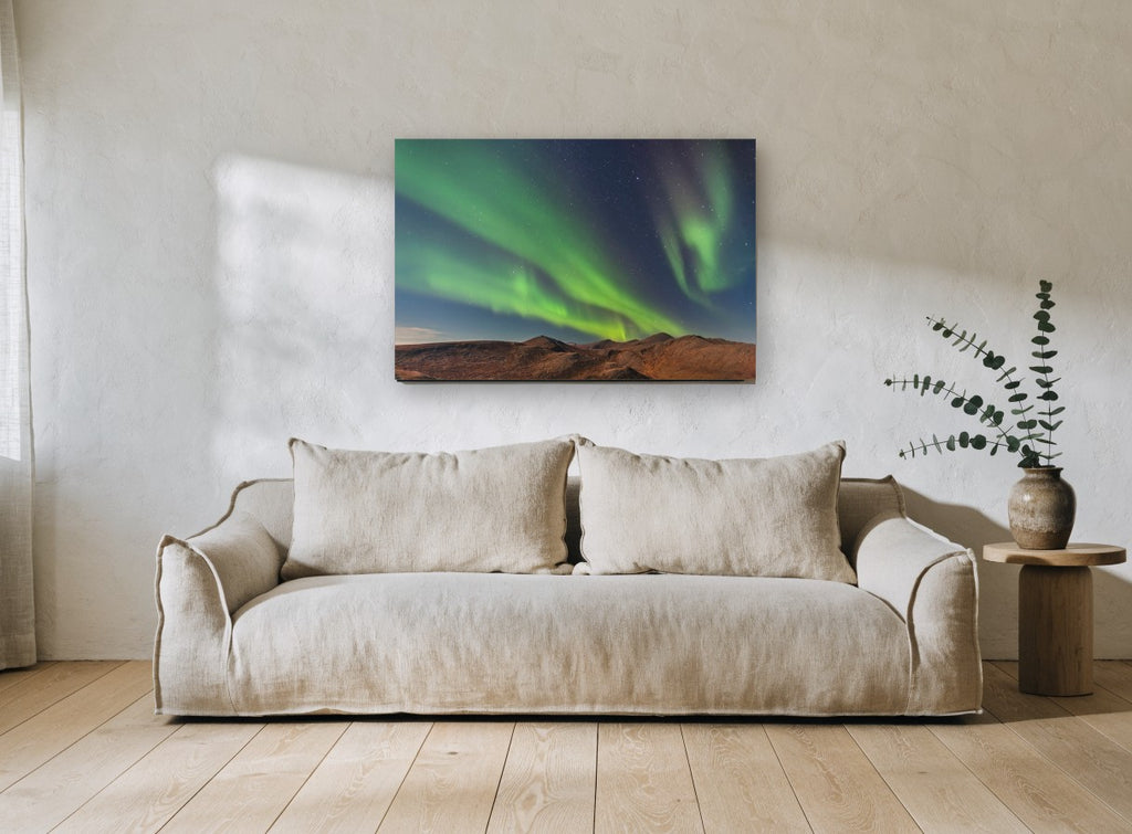 Green Aurora Ridge landscape canvas print on the wall of a living room