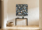 Wet Pebble Shore landscape canvas print on the wall of a hallway