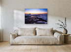 Crescent Moon Over Frozen Shore coastal canvas print on the wall of a living room