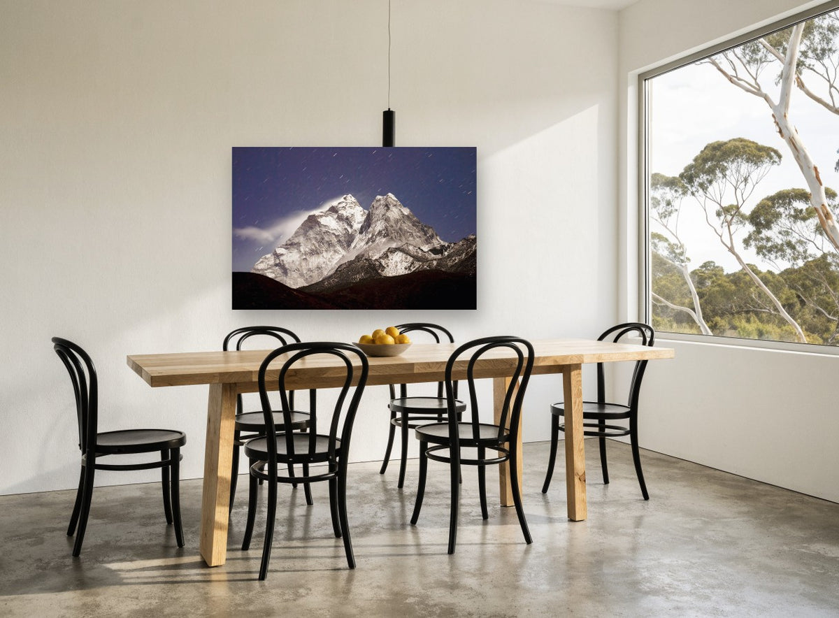 Moonlit Twin Peaks landscape canvas print on the wall of a dining room