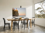 Moonrise Over the Cliff coastal canvas print on the wall of a dining room