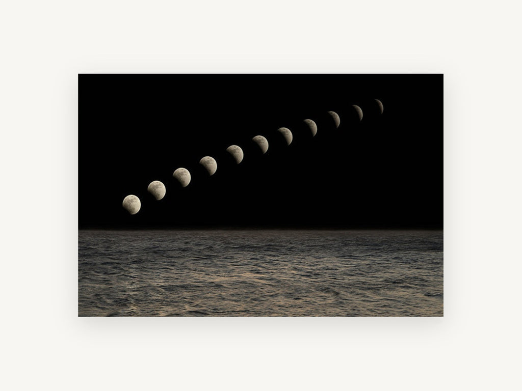 Moon Phases Over Sea, coastal canvas wall art print, front view