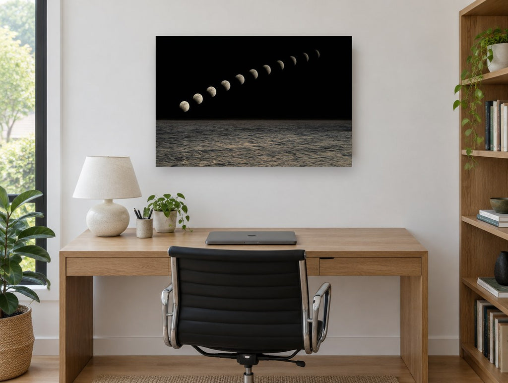 Moon Phases Over Sea coastal canvas print on the wall of a study