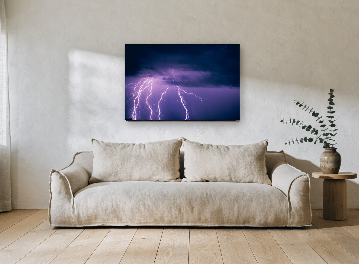Violet Storm Strikes landscape canvas print on the wall of a living room