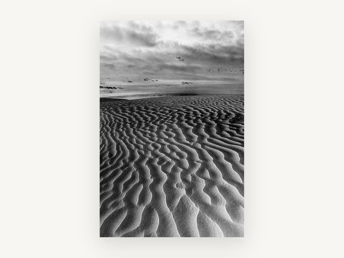 Rippled Dune Sweep, black and white sand dune ripples photograph, landscape canvas wall art print, front view