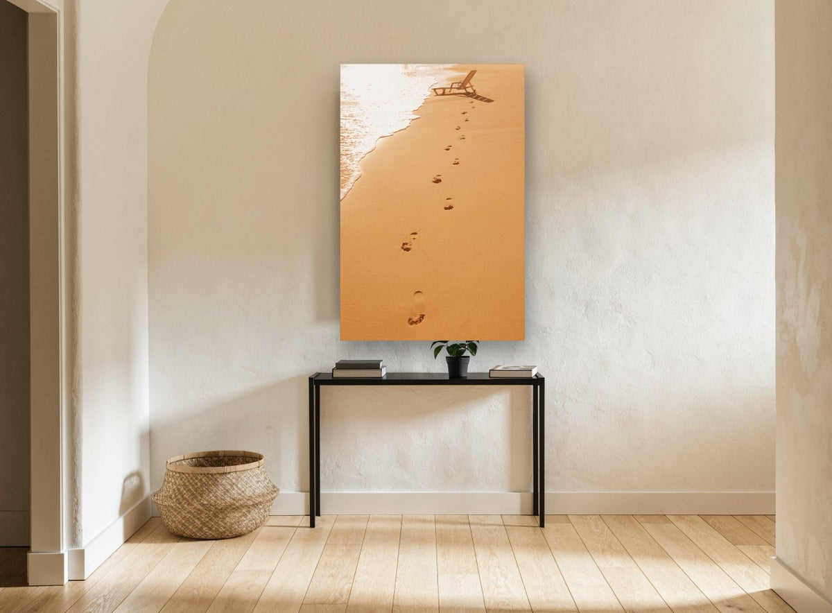 Footprints to the Deckchair coastal canvas print on the wall of a hallway