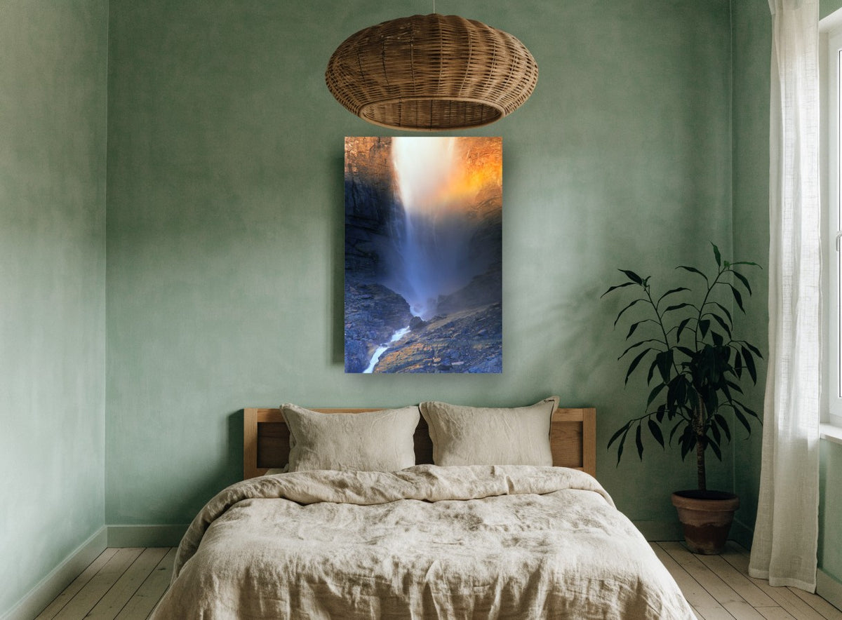 Rainbow Mist Falls landscape canvas print on the wall of a bedroom