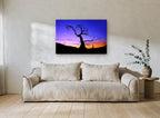 Twilight Bare Tree landscape canvas print on the wall of a living room