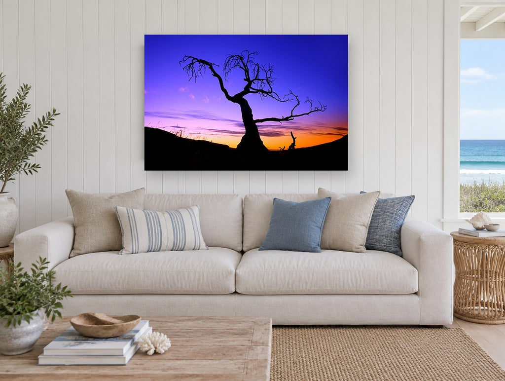 Twilight Bare Tree landscape canvas print on the wall of a beach house living room