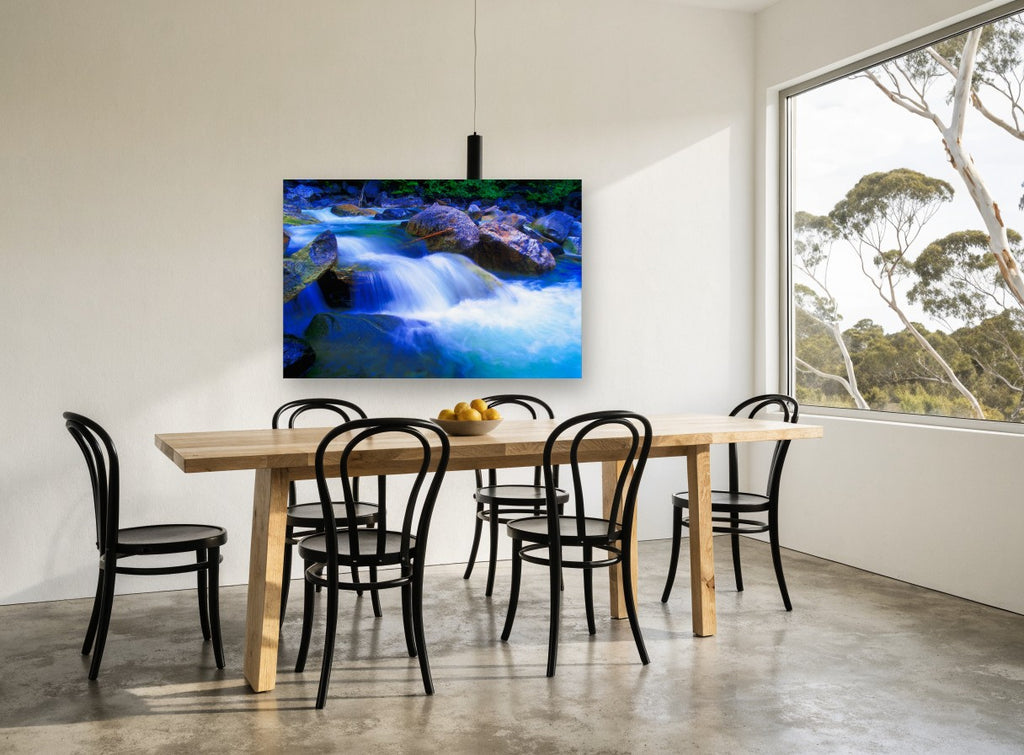 Blue Cascade Boulders landscape canvas print on the wall of a dining room