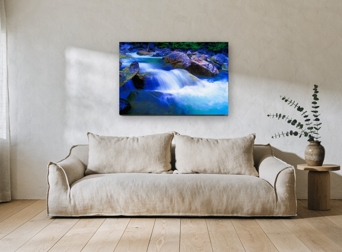 Blue Cascade Boulders landscape canvas print on the wall of a living room