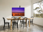 Purple Dusk Hay Bales landscape canvas print on the wall of a dining room