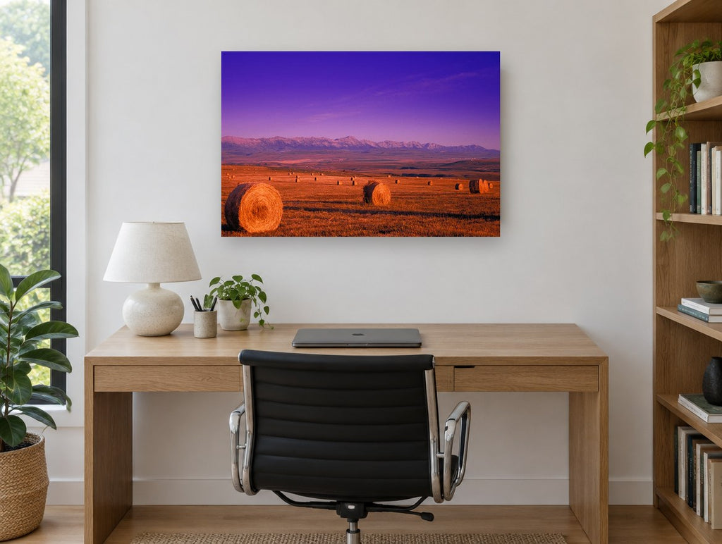 Purple Dusk Hay Bales landscape canvas print on the wall of a study