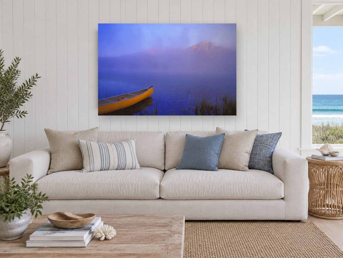 Yellow Canoe at Dawn landscape canvas print on the wall of a beach house living room