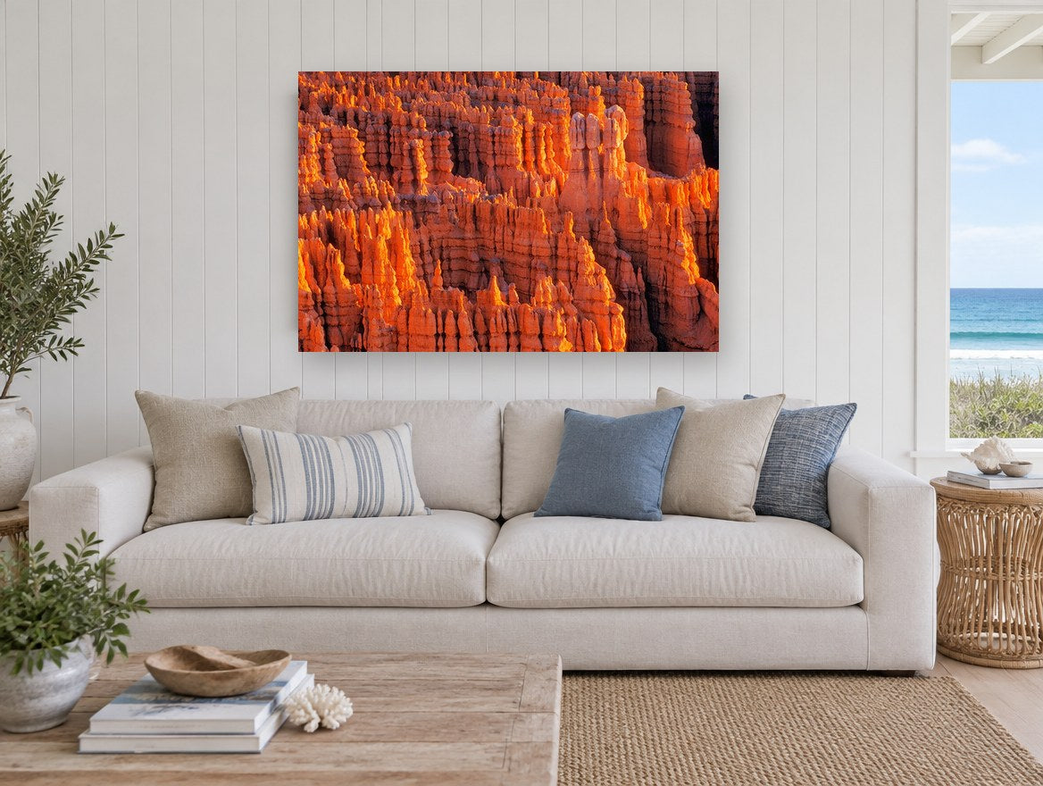 Glowing Hoodoo Amphitheatre landscape canvas print on the wall of a beach house living room