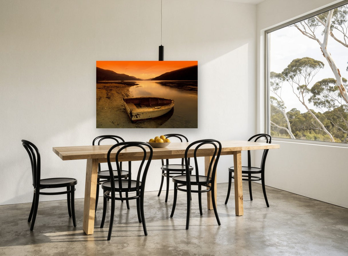 Stranded Rowboat Dusk landscape canvas print on the wall of a dining room