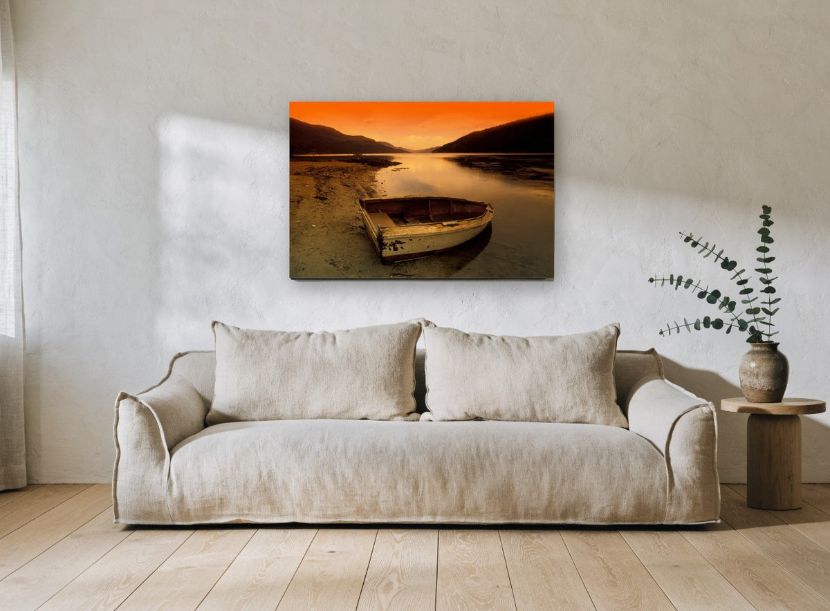 Stranded Rowboat Dusk landscape canvas print on the wall of a living room