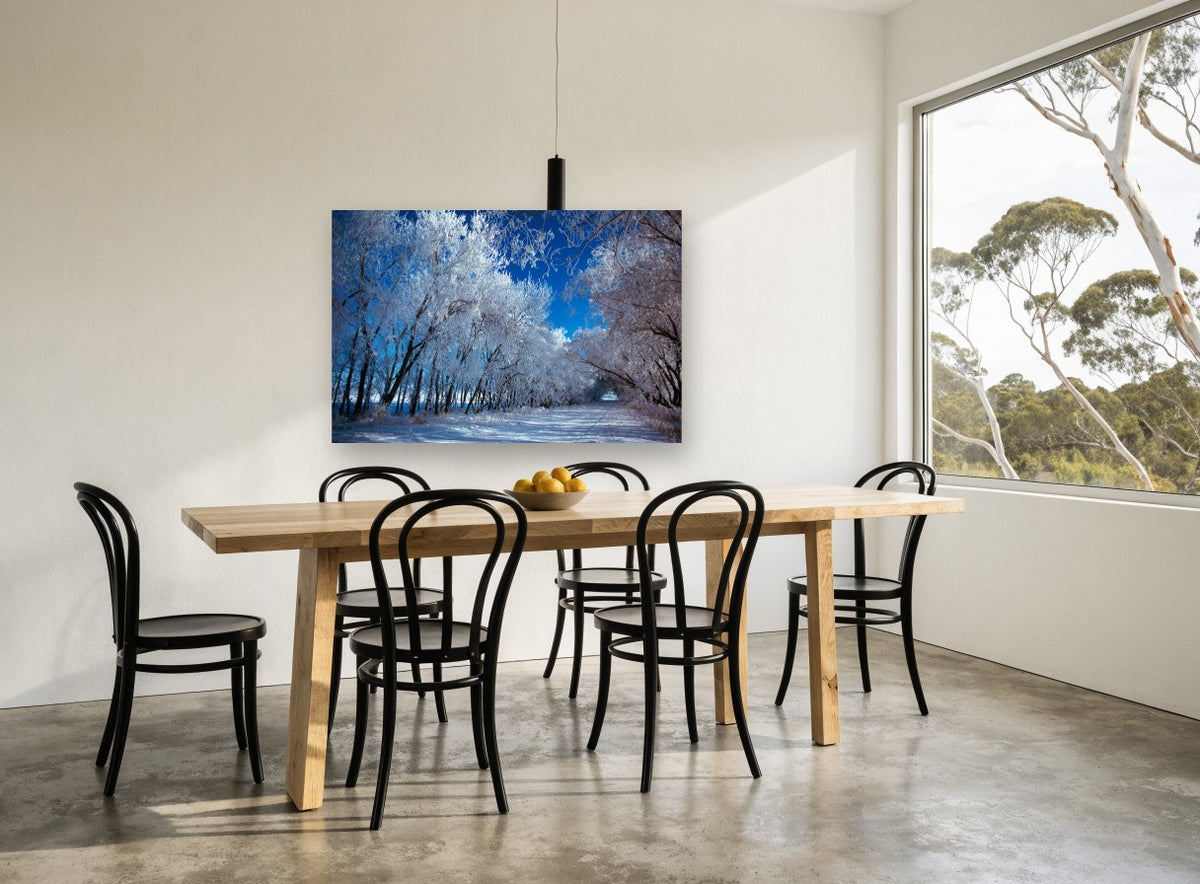 Frosted Lane landscape canvas print on the wall of a dining room