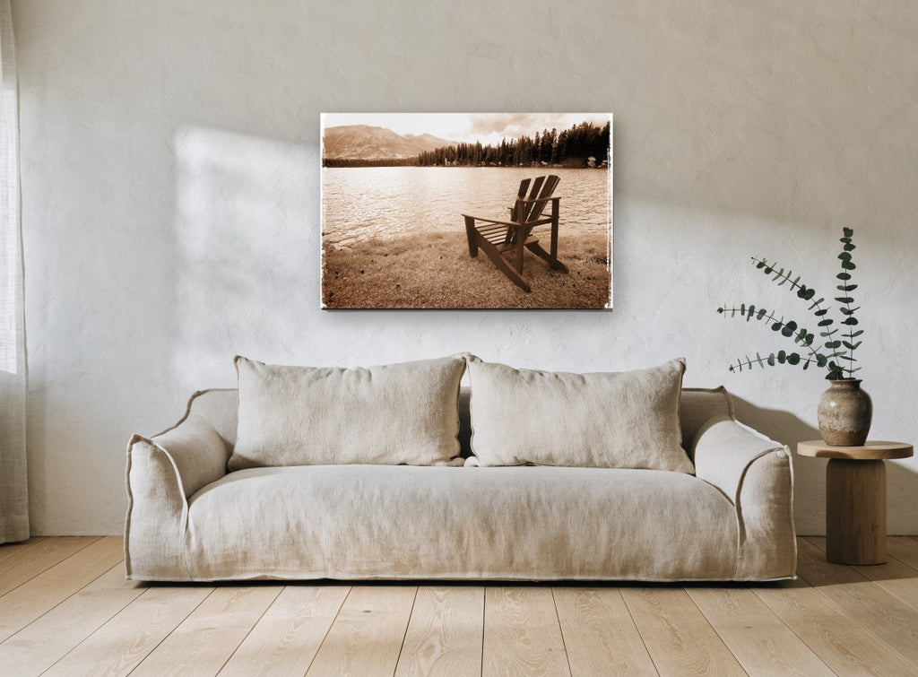 Lakeside Chair Sepia landscape canvas print on the wall of a living room