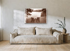 Two Chairs Lakeside landscape canvas print on the wall of a living room