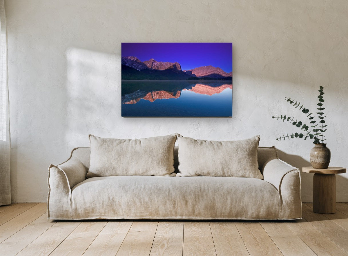 Violet Dawn Mirror Lake landscape canvas print on the wall of a living room