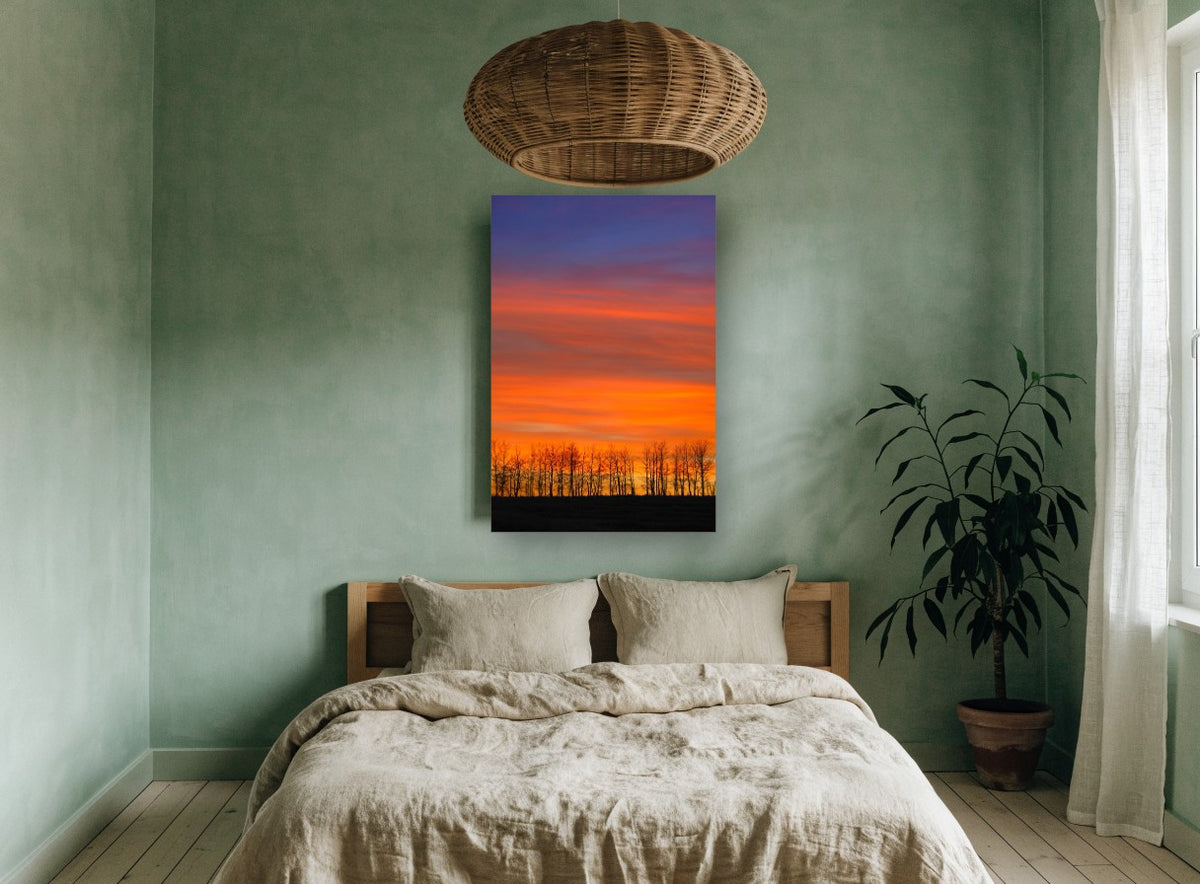 Ember Sky Treeline landscape canvas print on the wall of a bedroom