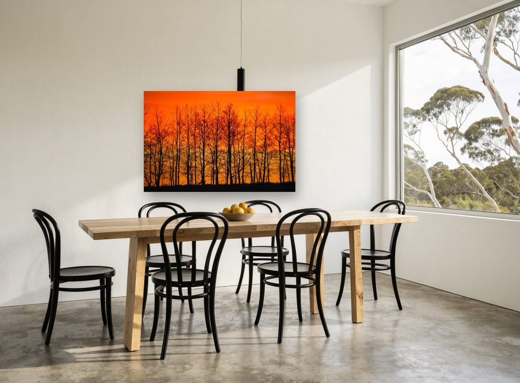 Ember Sky Tree Line landscape canvas print on the wall of a dining room