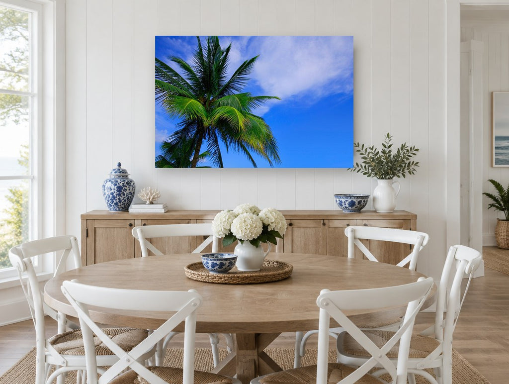 Palm Against Blue landscape canvas print on the wall of a Hamptons dining room