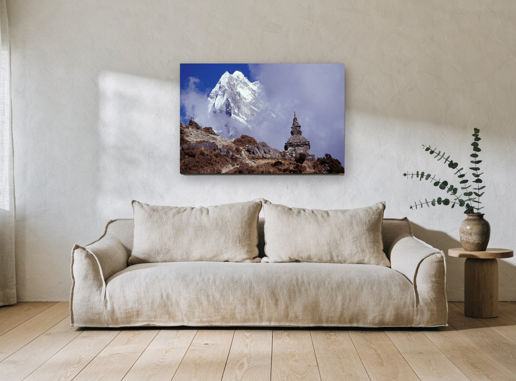 Stupa Beneath the Peak landscape canvas print on the wall of a living room