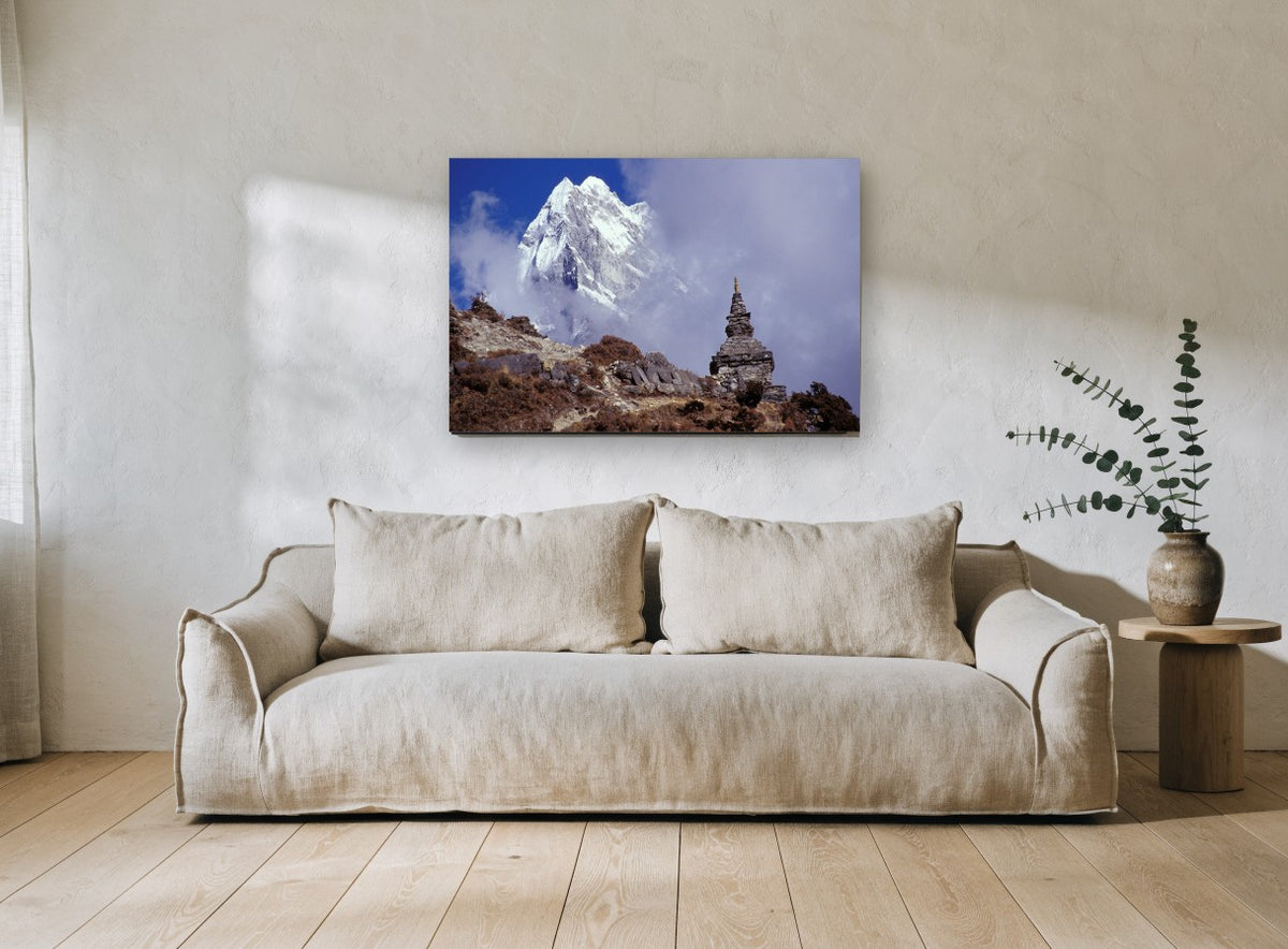 Stupa Beneath the Peak landscape canvas print on the wall of a living room