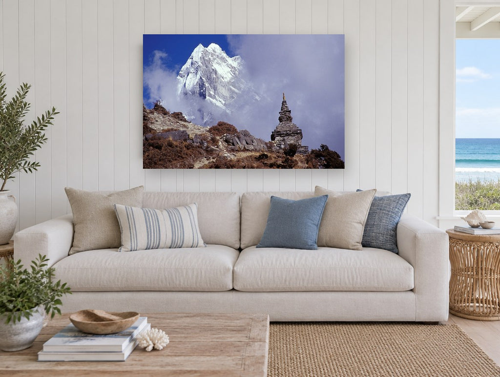 Stupa Beneath the Peak landscape canvas print on the wall of a beach house living room