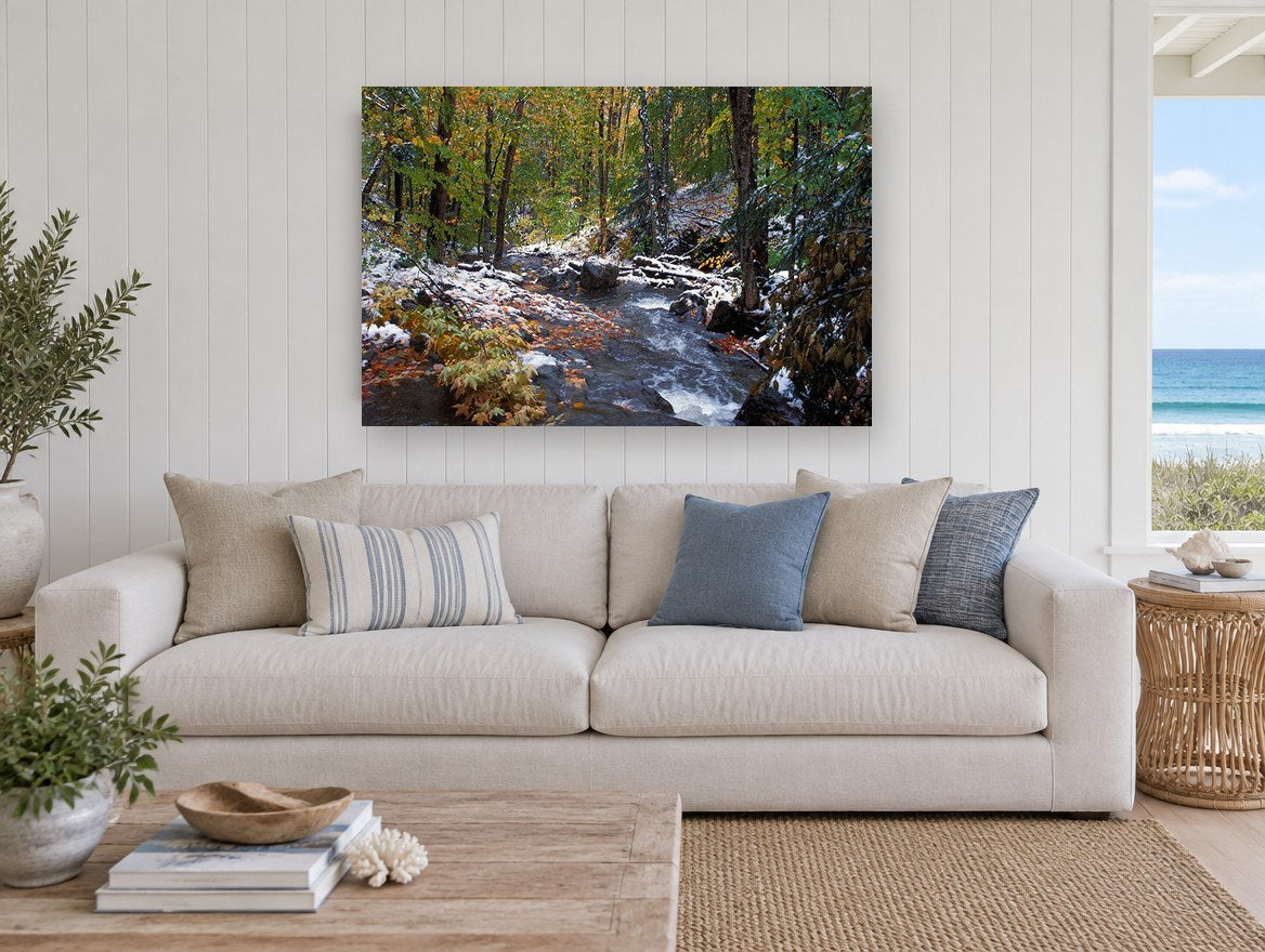 First Snow Creek landscape canvas print on the wall of a beach house living room