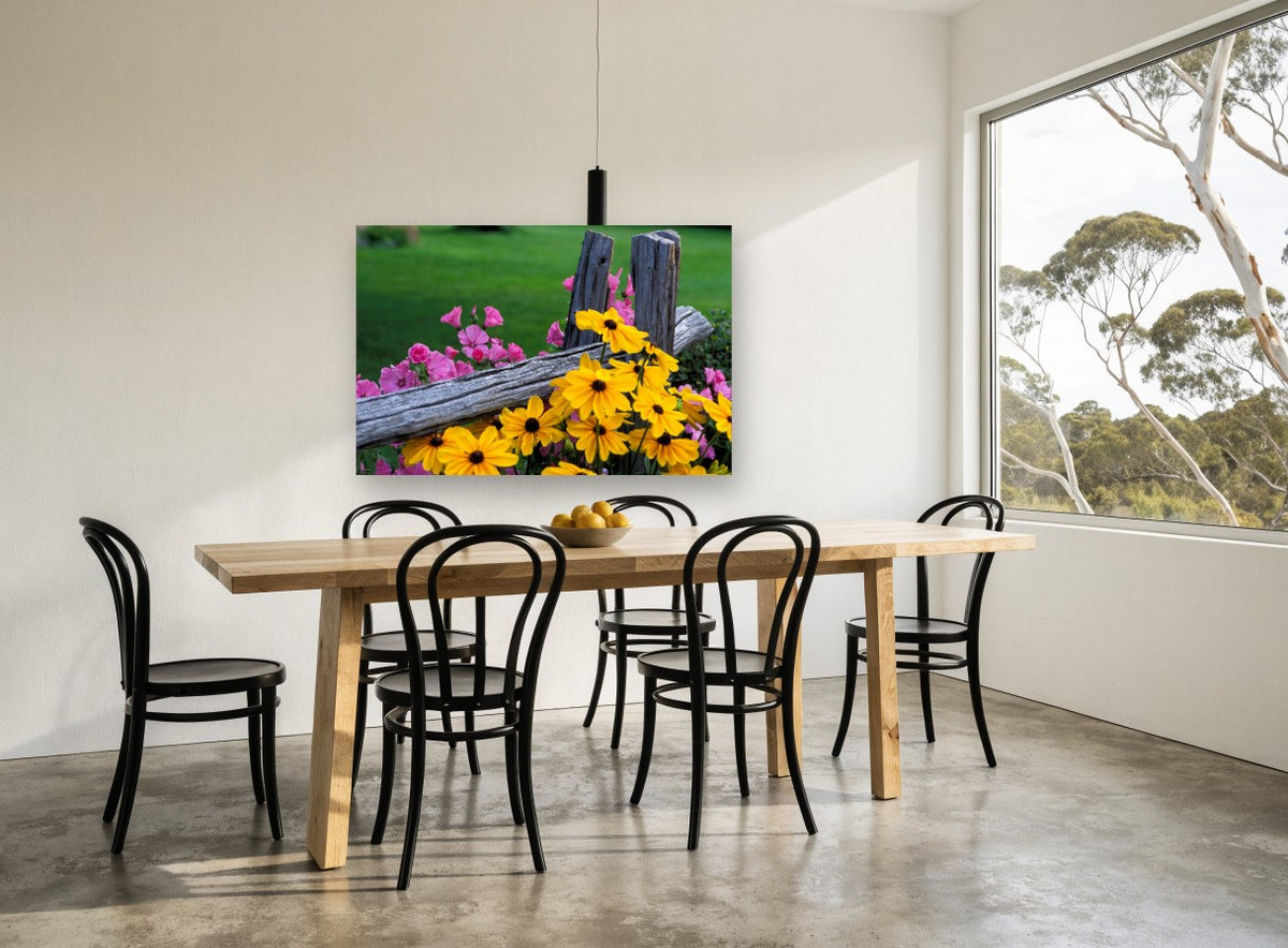 Fence Line Blooms floral canvas print on the wall of a dining room