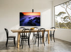 Misty Rocks at Dusk coastal canvas print on the wall of a dining room