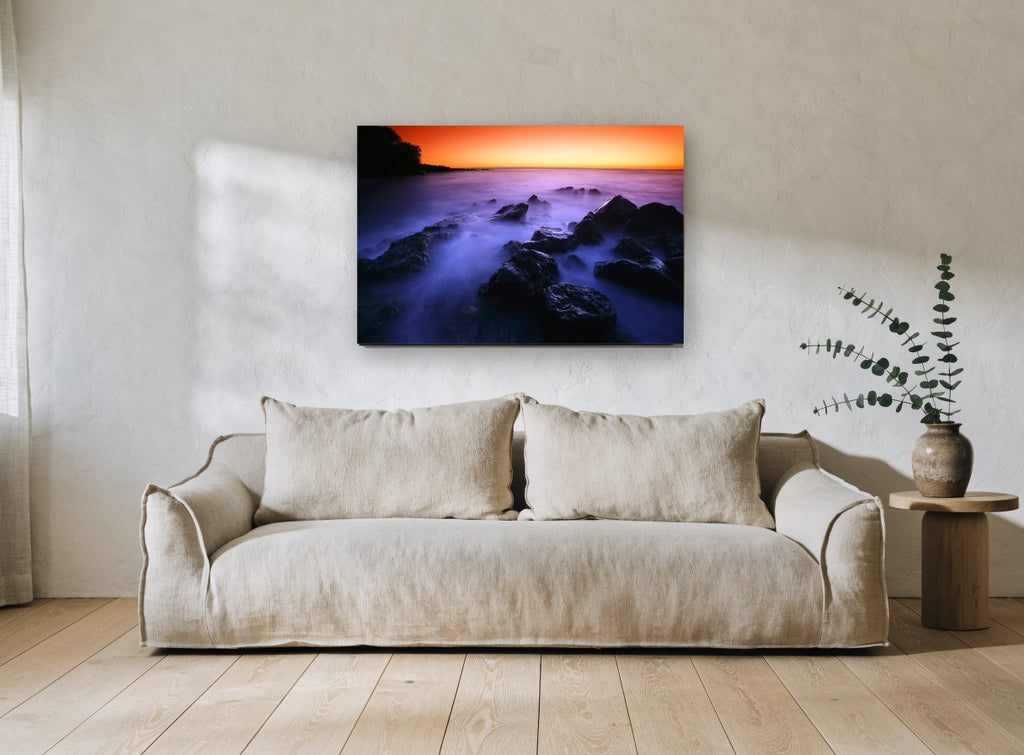 Misty Rocks at Dusk coastal canvas print on the wall of a living room