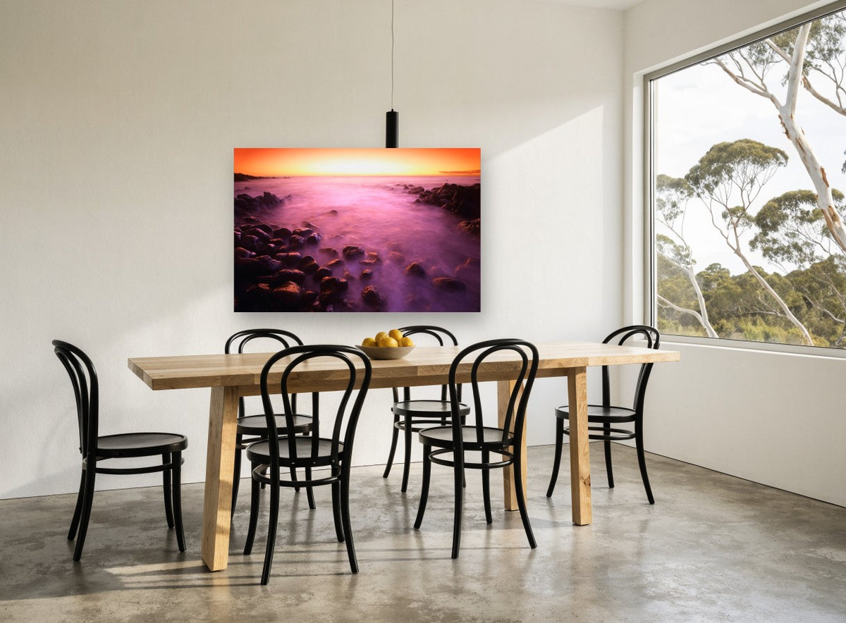 Violet Tide Sunset coastal canvas print on the wall of a dining room