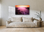 Violet Tide Sunset coastal canvas print on the wall of a living room