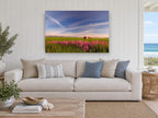 Pink Phlox Prairie landscape canvas print on the wall of a beach house living room