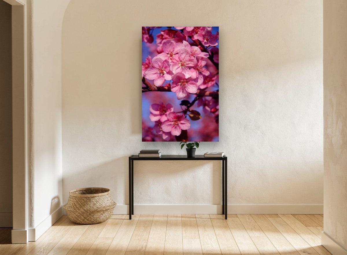 Crabapple Blossom Glow floral canvas print on the wall of a hallway