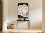 Dew on Cream Rose floral canvas print on the wall of a hallway