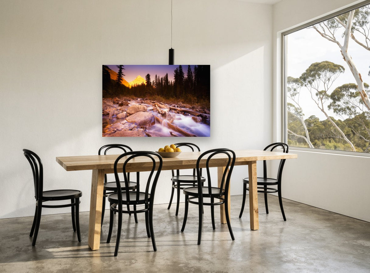 Alpenglow Over the Creek landscape canvas print on the wall of a dining room
