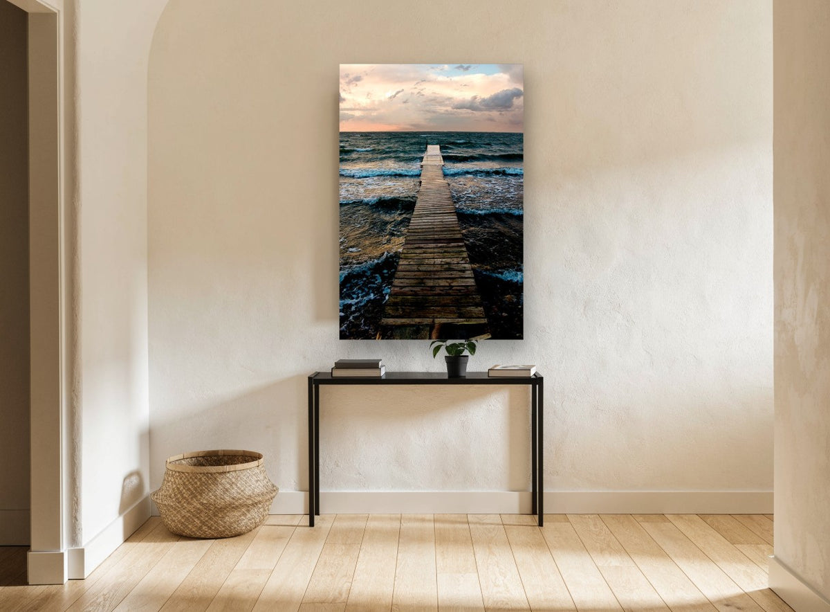 Jetty into the Squall coastal canvas print on the wall of a hallway
