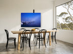 Blue Fog Marina coastal canvas print on the wall of a dining room