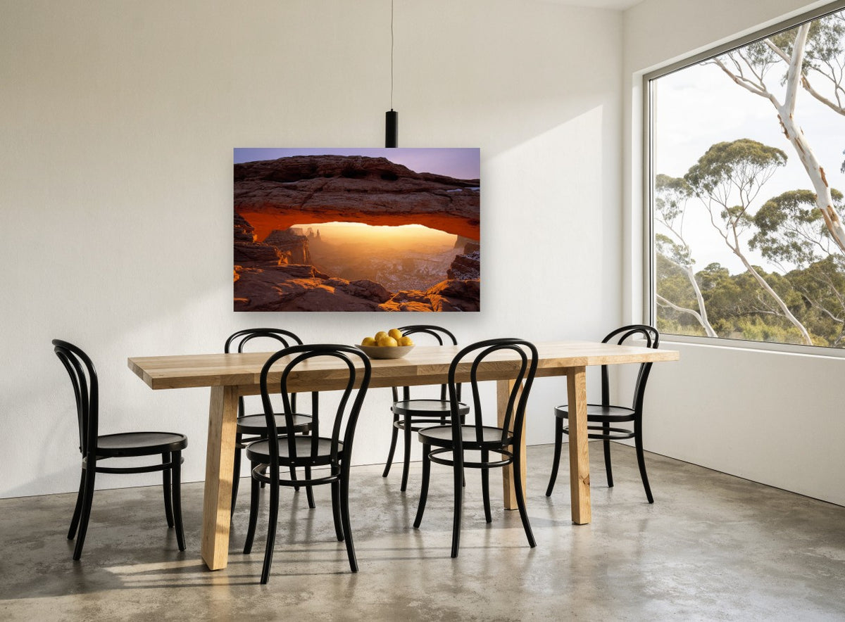 Glowing Rock Arch landscape canvas print on the wall of a dining room