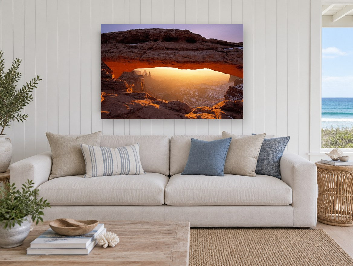 Glowing Rock Arch landscape canvas print on the wall of a beach house living room