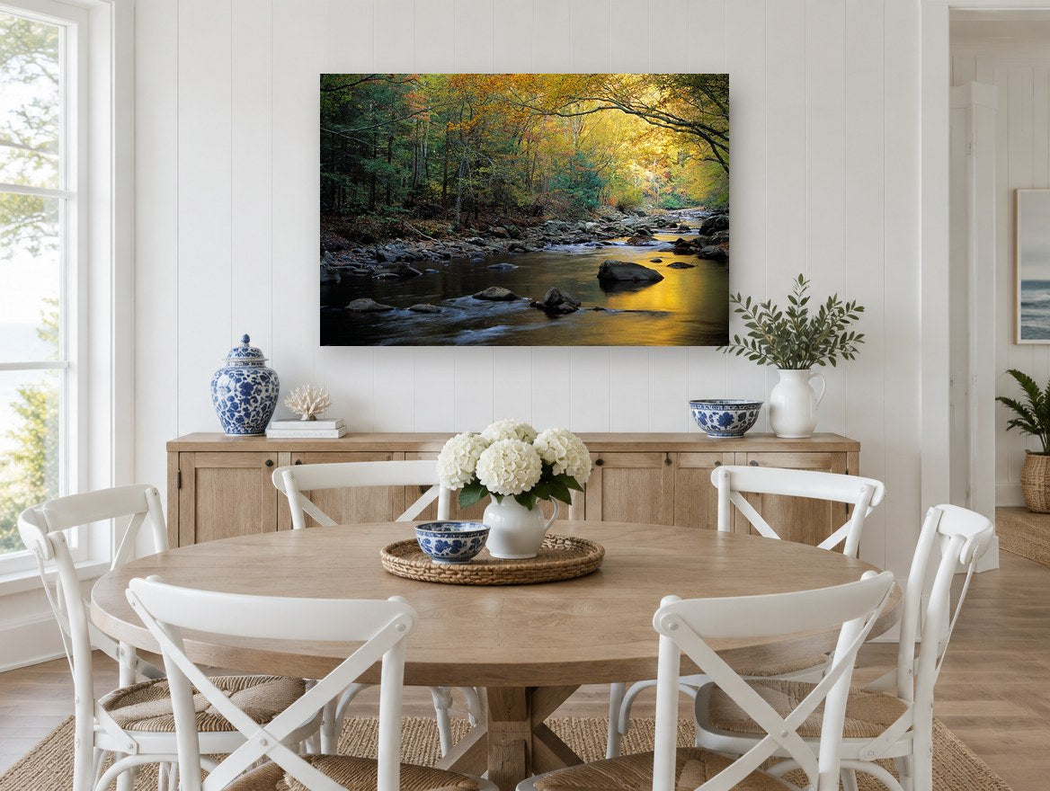 Golden Autumn Creek landscape canvas print on the wall of a Hamptons dining room