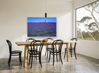 Lavender Stone Hut landscape canvas print on the wall of a dining room