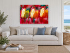 Tulip Trio Glow floral canvas print on the wall of a beach house living room